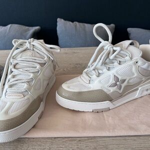 Sneakers, brand new ! Only used 1 time and comes with LV bag